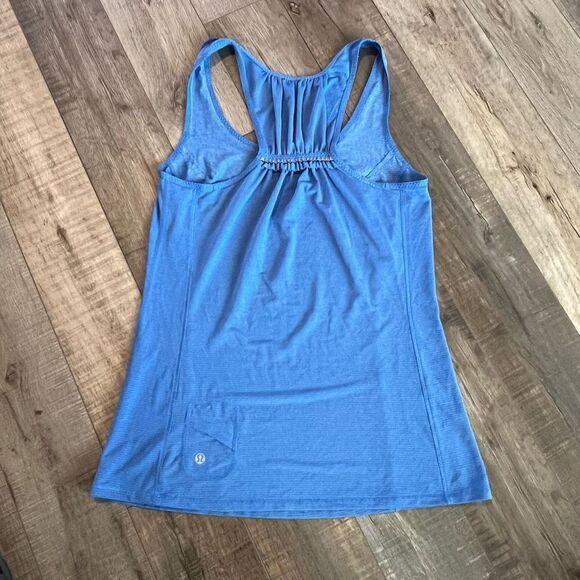 Lululemon Running Tank Top 6
Racerback Reflective Strip Media
Pocket Athletic - Picture 2 of 3